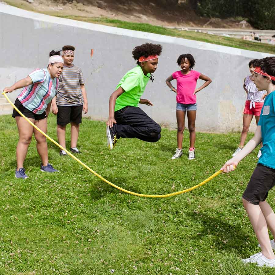 EarthShare - Combined Federal Campaign CFC - Kids Jumping Rope Outside at a Playground