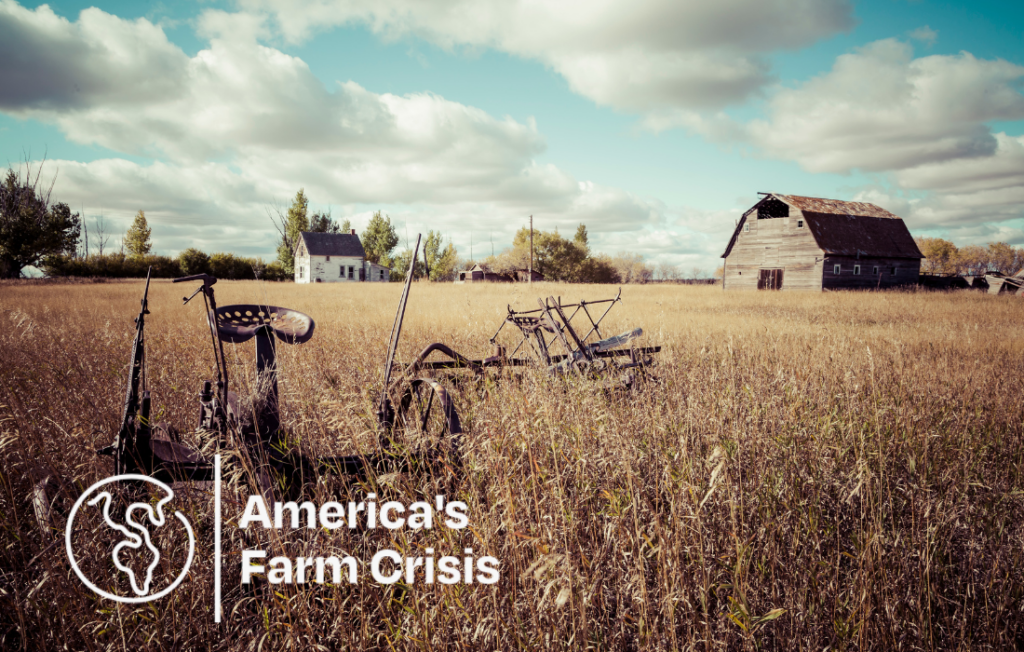 Abandoned machinery on farm near barn