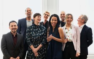 EarthShare News - Purpose of “Purpose” in Small Companies – 6 Reasons Why Doing Good Pays Off - Laughing Office Co-workers