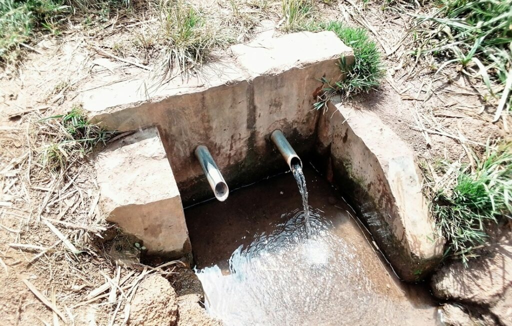 water coming out of natural spring in Kenya