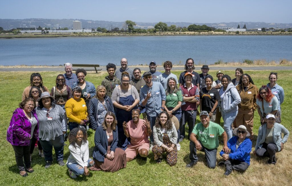 group photo near riverbank